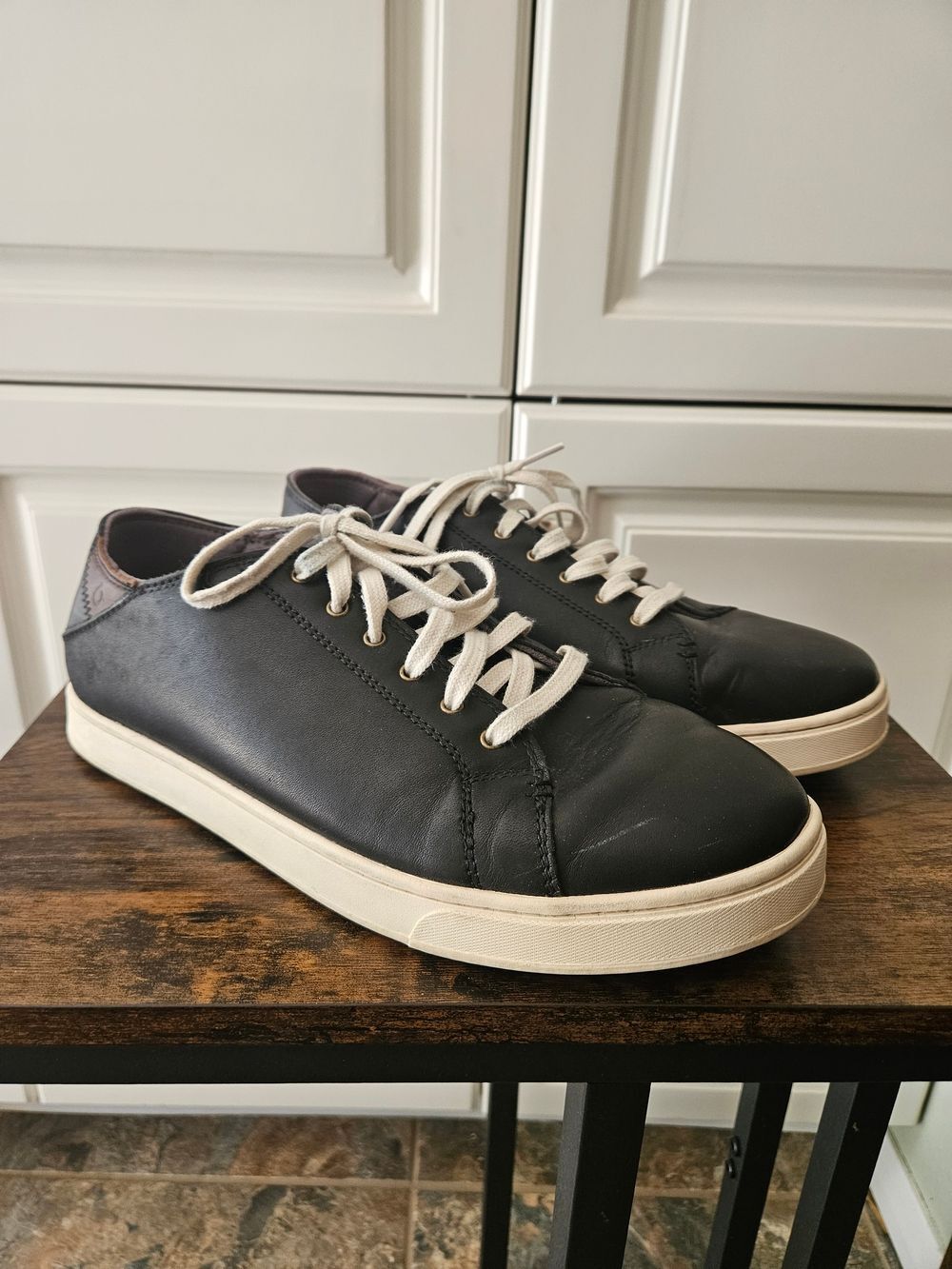OluKai Kahu 'Eono Black Leather Sneakers Island Luxe Coastal Smart Casual Travel